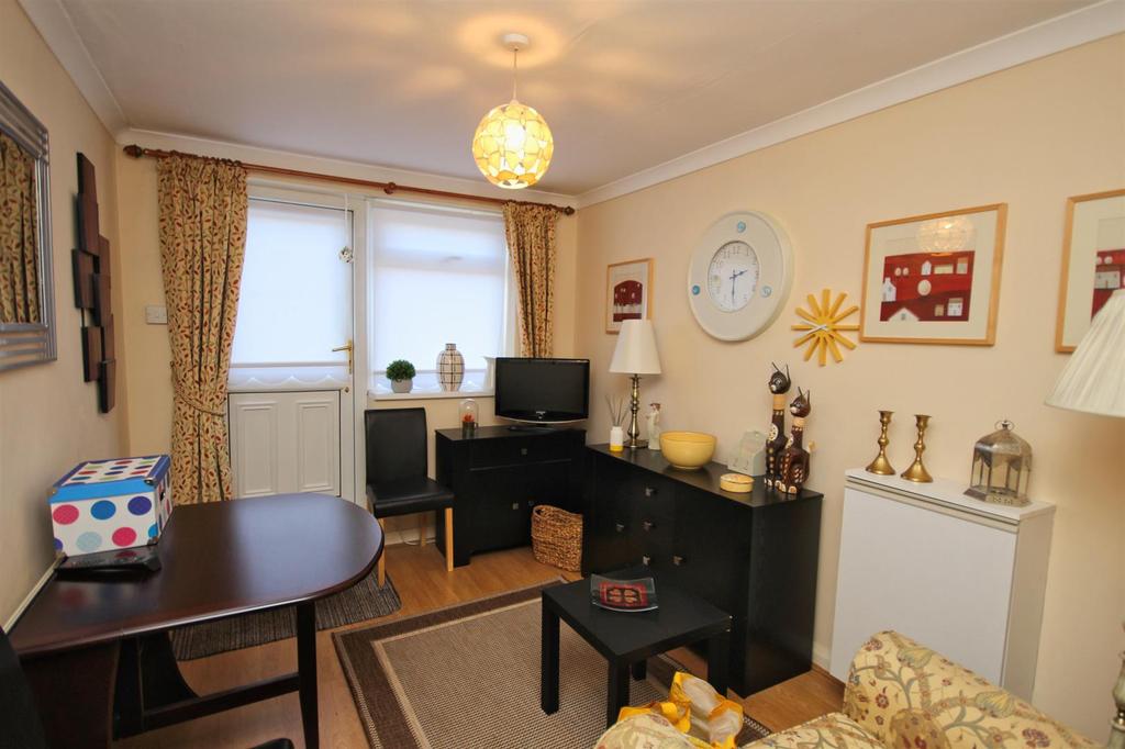 Bedroom Three used as a second sitting room leadin