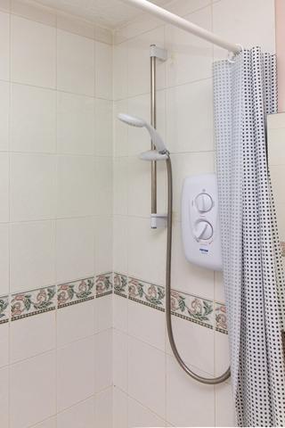 Shower over bath