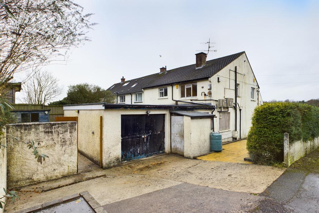 Garage, parking and side garden