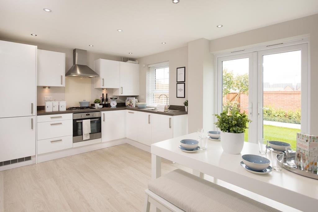 Internal shot of Moresby kitchen with French doors to garden