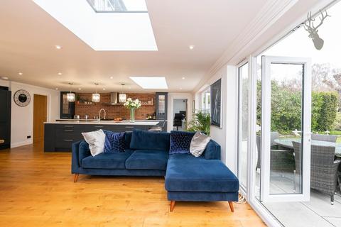50 Orchard Drive, Theydon Bois, Epping, CM16 7DJ