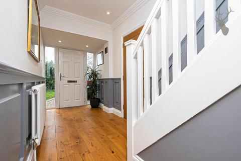 50 Orchard Drive, Theydon Bois, Epping, CM16 7DJ