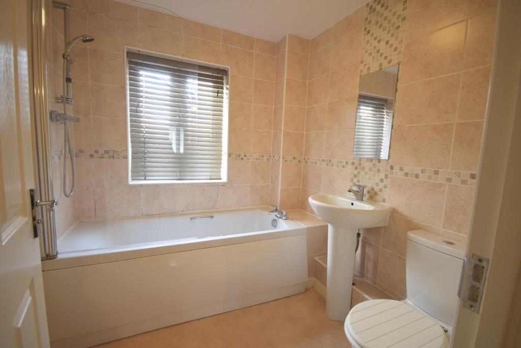 Bathroom with shower over