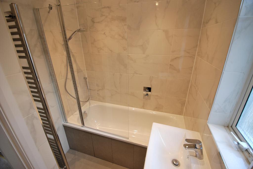 Fully Tiled Family Bathroom