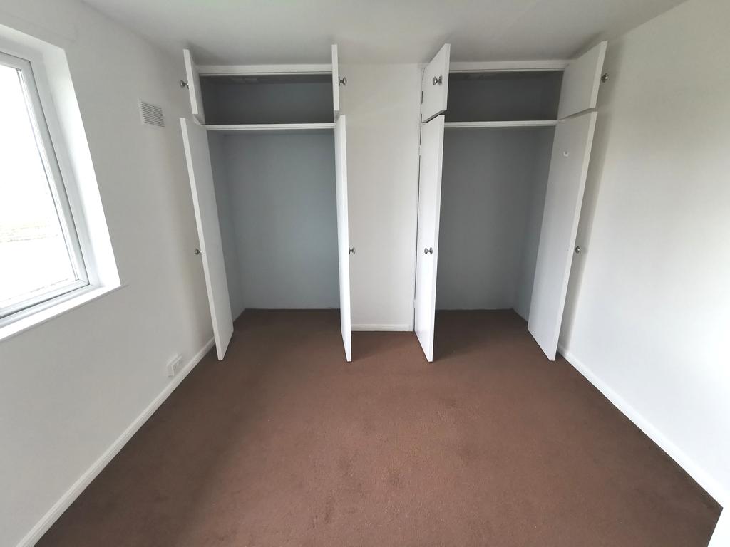 Deeep storage cupboadrs bedroom 2