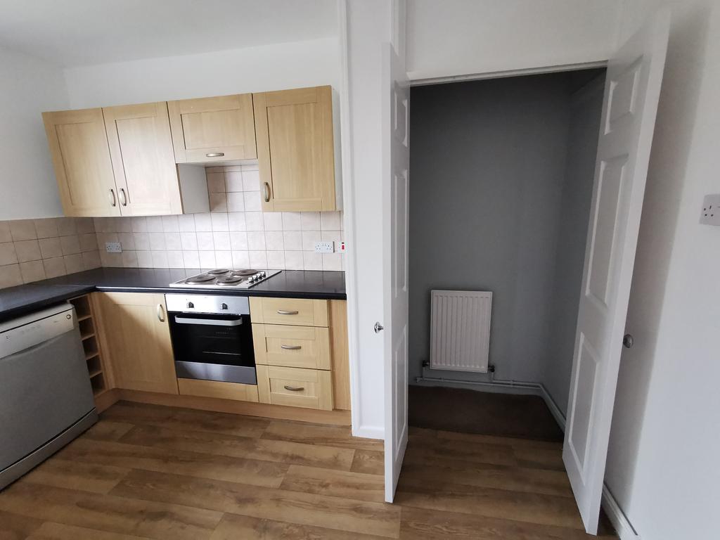 Depp storage cupboard with radiator