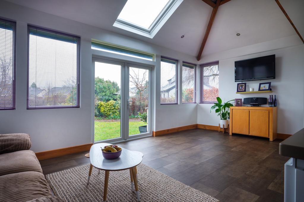 Living area with doors to garden