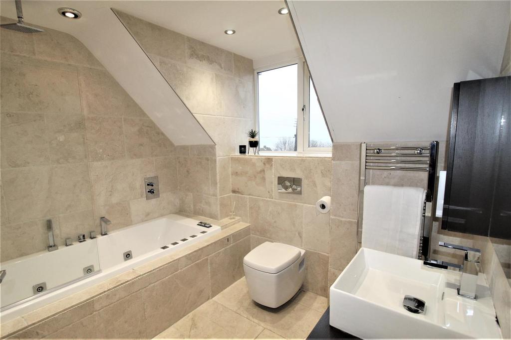 FAMILY BATHROOM with jacuzzi bath