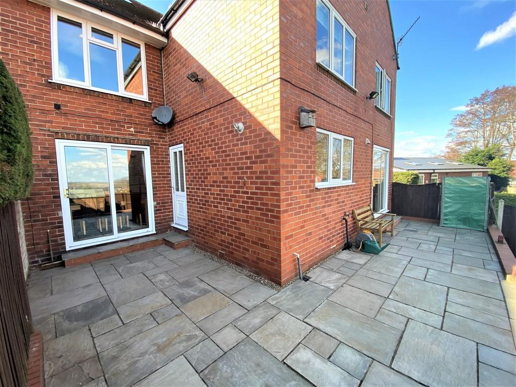 Rear Paved entertainment Area