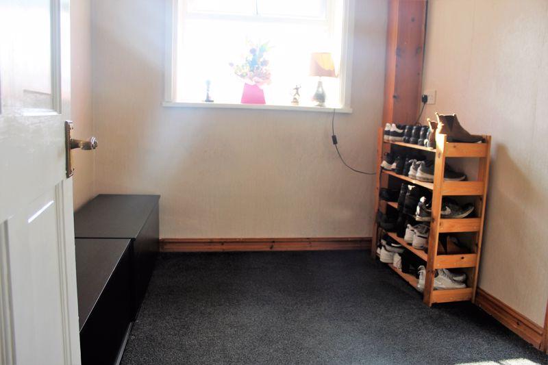 Rear Cloak Room or