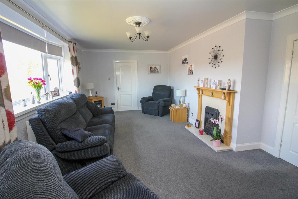 Sitting Room with arch to Dining Area