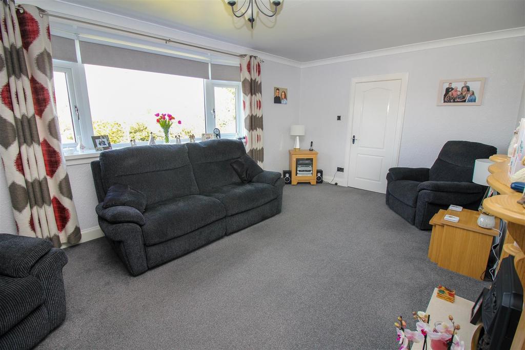 Sitting Room with arch to Dining Area