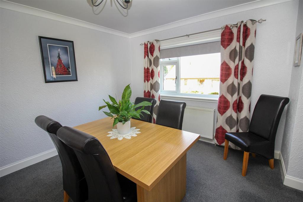 Sitting Room with arch to Dining Area