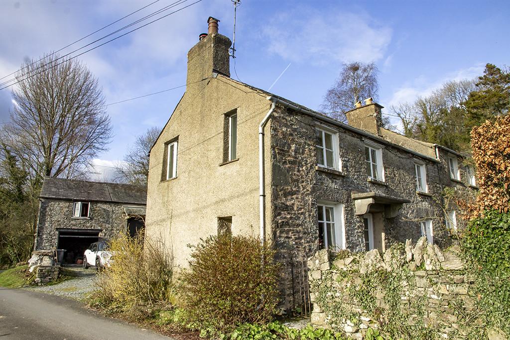 Rear aspect of cottage and garage