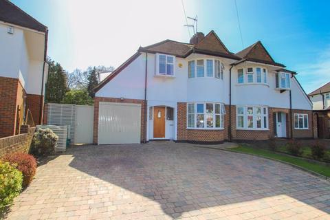 16 Manor Drive, Esher, KT10 0AX