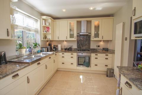 16 Manor Drive, Esher, KT10 0AX