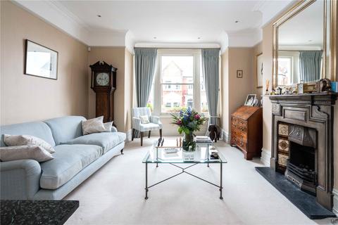 32 Bernard Gardens, London, SW19 7BE