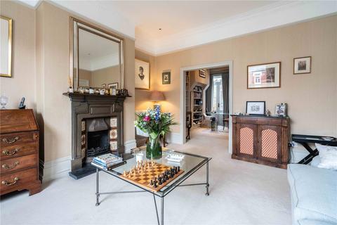 32 Bernard Gardens, London, SW19 7BE