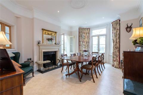32 Bernard Gardens, London, SW19 7BE