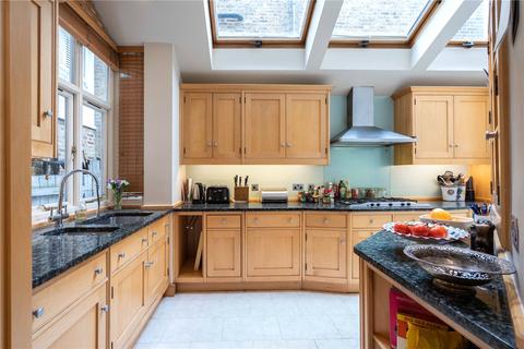 32 Bernard Gardens, London, SW19 7BE
