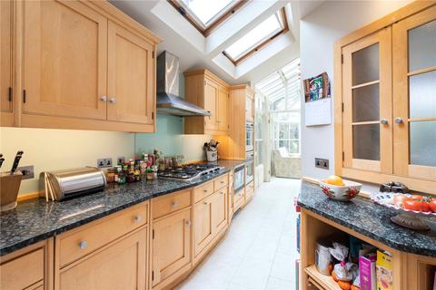 32 Bernard Gardens, London, SW19 7BE