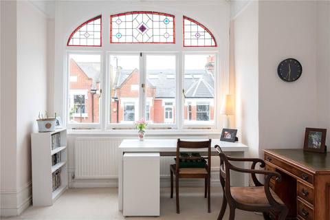 32 Bernard Gardens, London, SW19 7BE