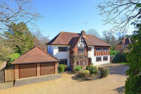 Four Oaks Forest Road, East Horsley, Leatherhead, KT24 5BT
