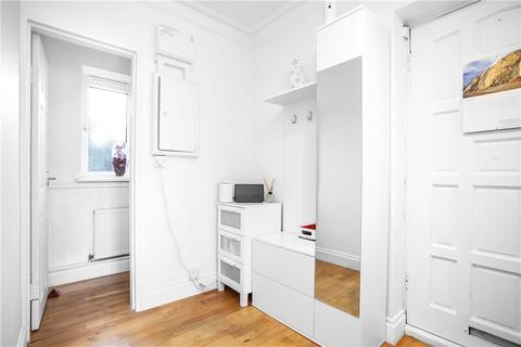 21 Thursley Gardens, London, SW19 6JT