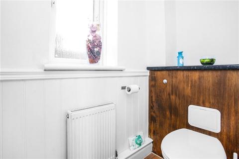 21 Thursley Gardens, London, SW19 6JT
