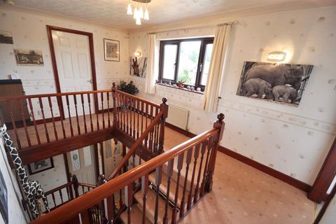 21 Bridgefield Drive, Bury, BL9 7PE