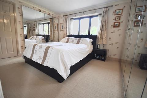 21 Bridgefield Drive, Bury, BL9 7PE