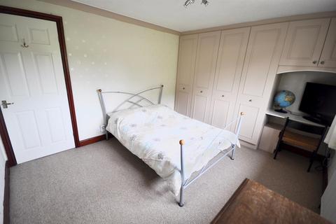 21 Bridgefield Drive, Bury, BL9 7PE