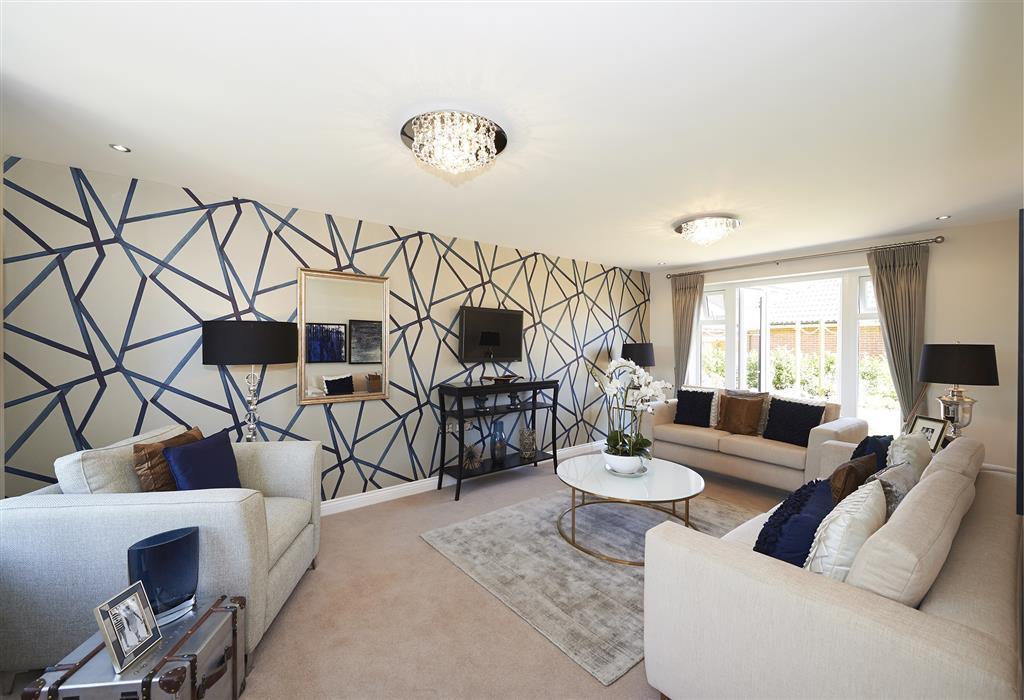 This stunning living room boasts double doors to the rear garden