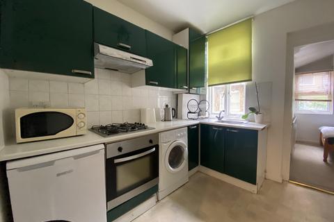 WARWICK ROAD, EARLS COURT, LONDON W14