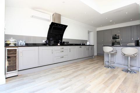 31 Garratts Lane, Banstead, SM7 2EA