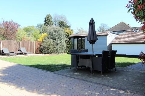 31 Garratts Lane, Banstead, SM7 2EA
