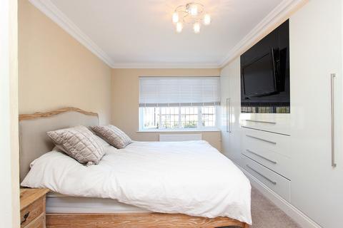 31 Garratts Lane, Banstead, SM7 2EA