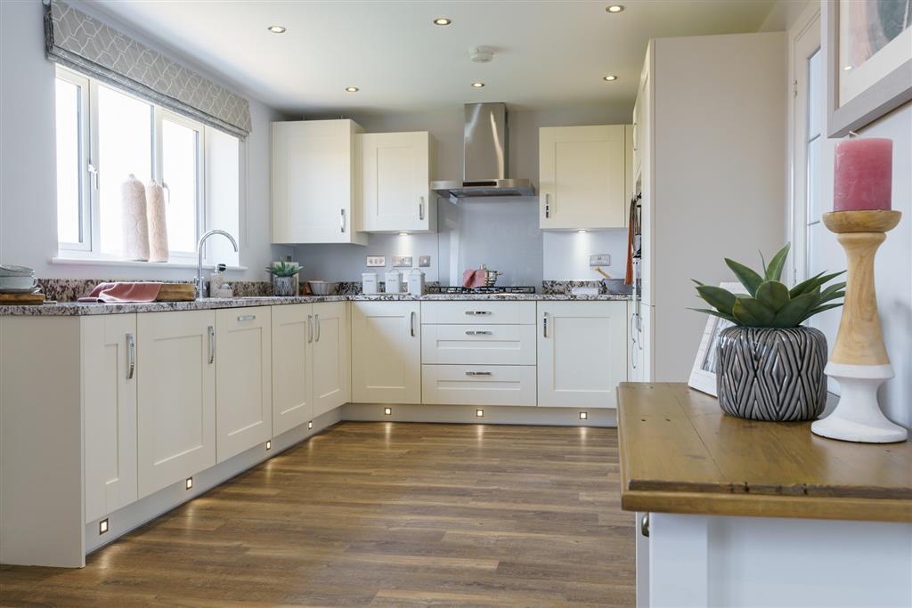 A modern kitchen/dining area with heaps of storage