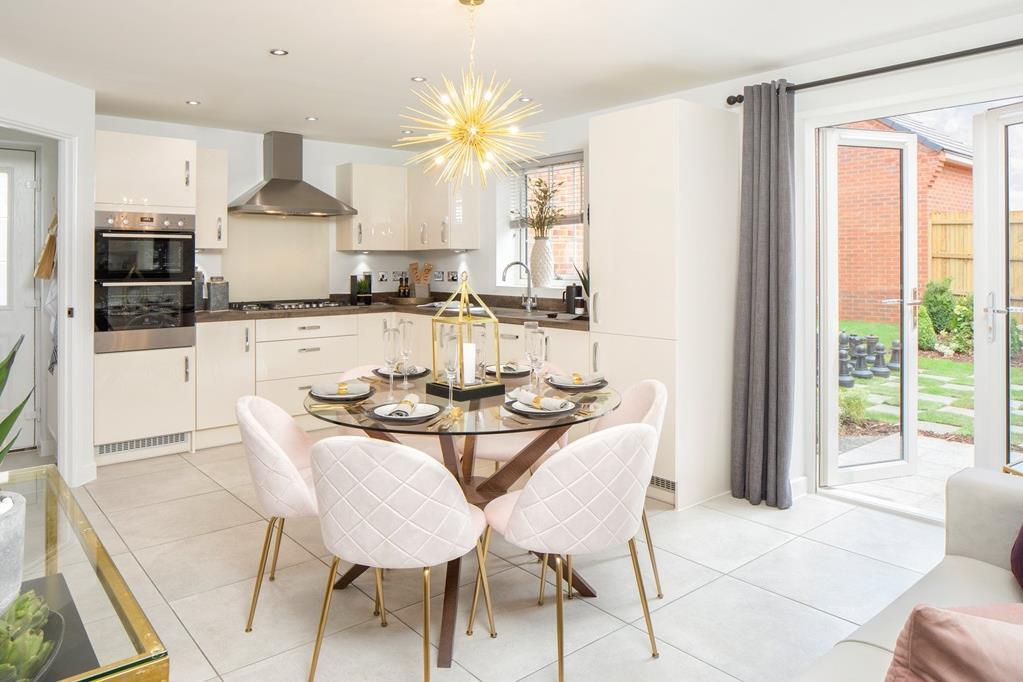 Open plan kitchen / dining room with french doors to the garden in the Irving 4 bedroom detached hom