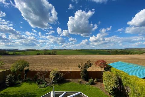 65 Corby Road, Swayfield, Grantham, NG33 4LH