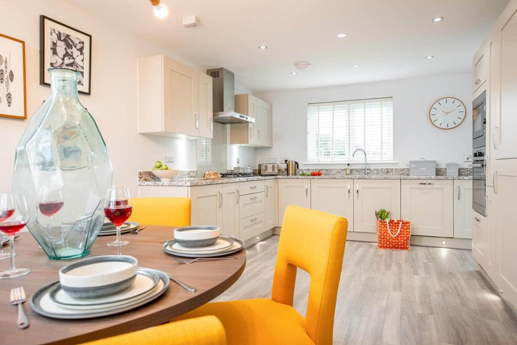 An open plan kitchen and dining area creates a social hub of the home