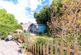 Sunny rear garden with shed