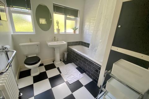 12 Alcester Road, Gatley, Cheadle, SK8 4PG