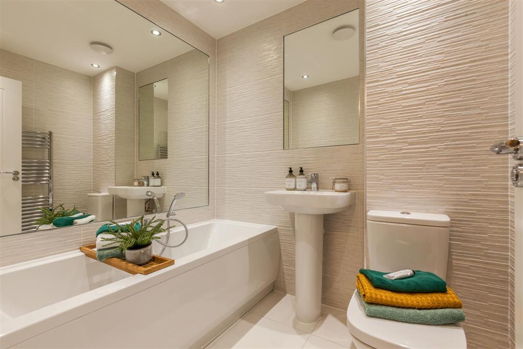 Main bathroom with bath and shower