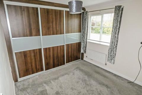 22 Rothbury Drive, Ashington, NE63 8TQ