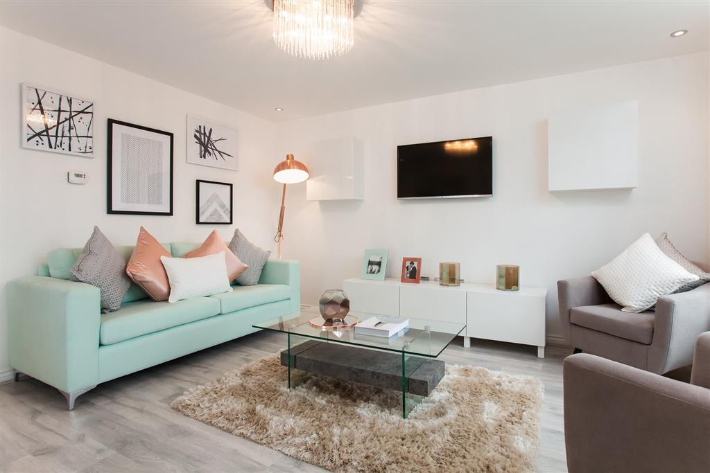 Two three seater sofas provide space for the whole family to chill in the evenings