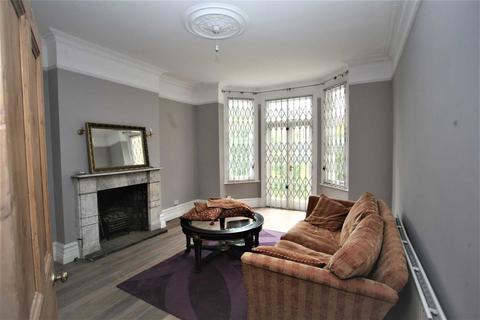 20 Bernard Gardens, London, SW19 7BE