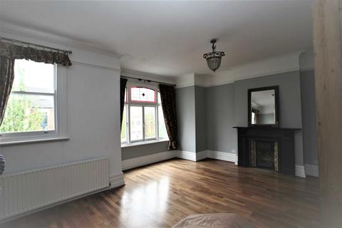 20 Bernard Gardens, London, SW19 7BE