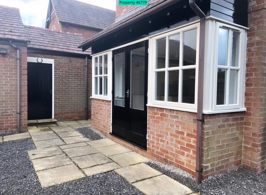 Rear entrance main doors