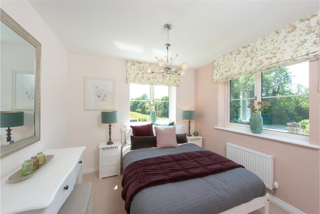 A double bedroom with storage space